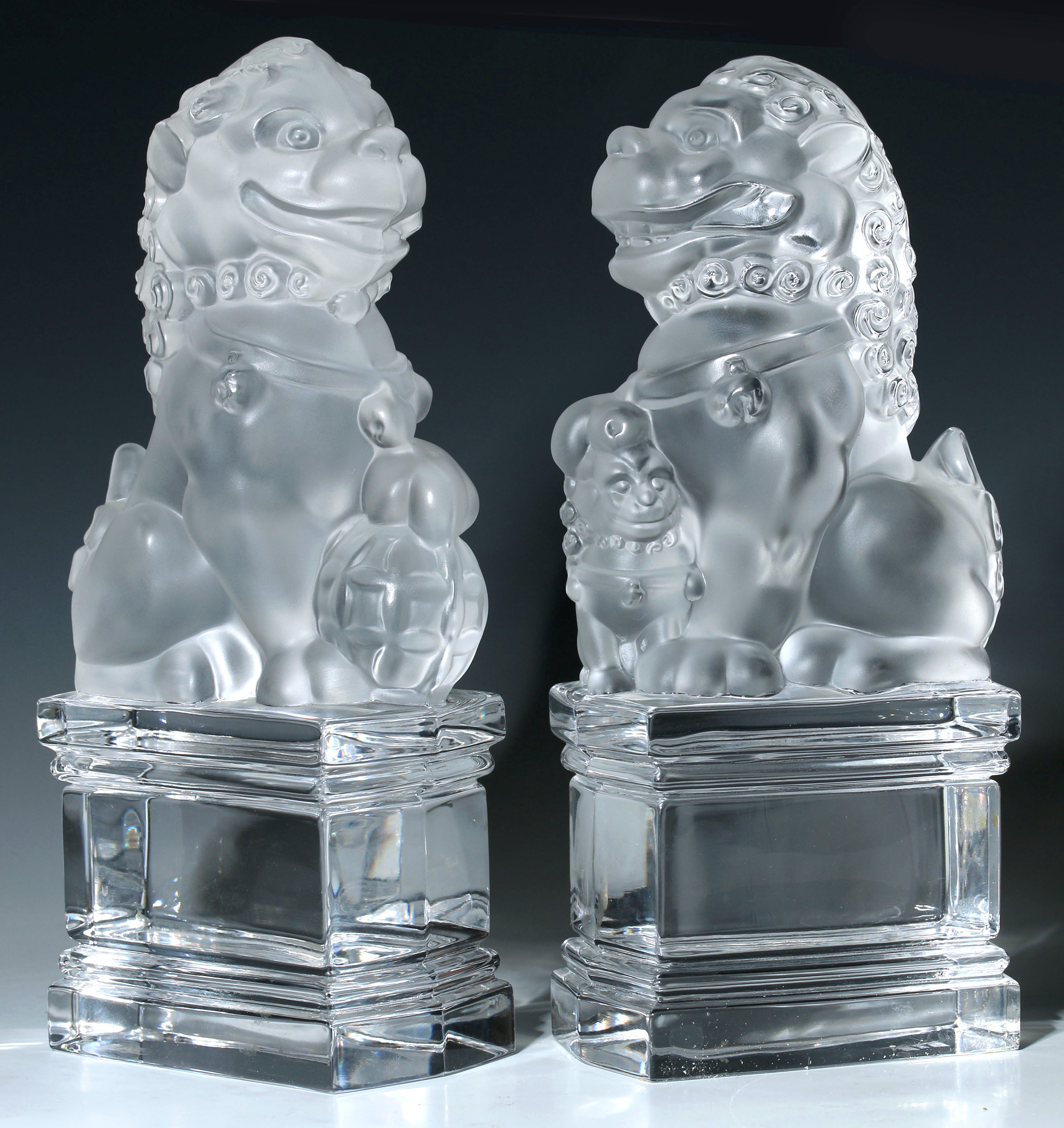 A PAIR CRYSTAL FOO DOGS SIGNED NEIMAN MARCUS FRANC