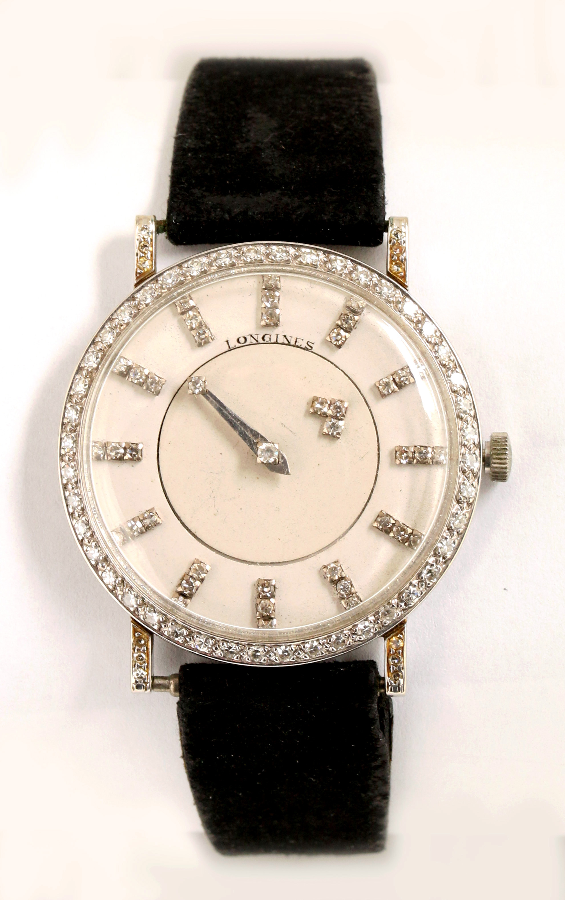 A GENT'S 18K WHITE GOLD AND DIAMOND LONGINES WATCH