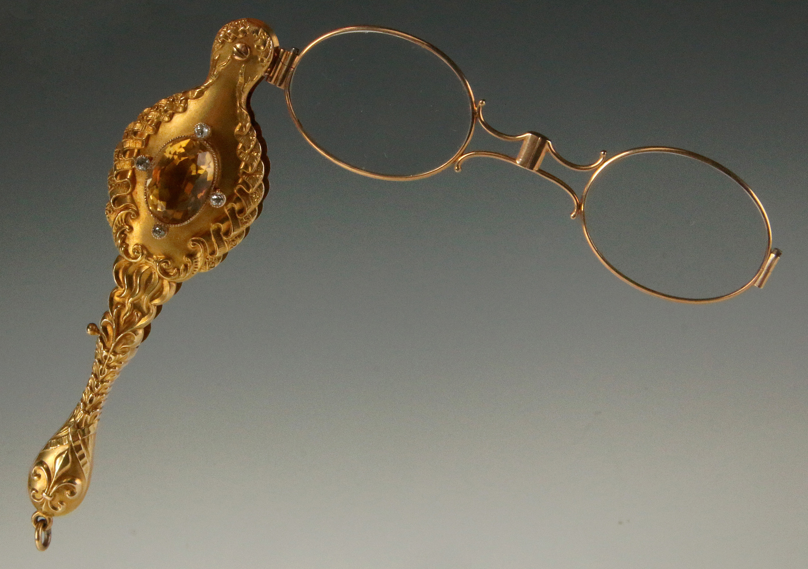 A 14k VICTORIAN LORGNETTE WITH DIAMONDS AND TOPAZ