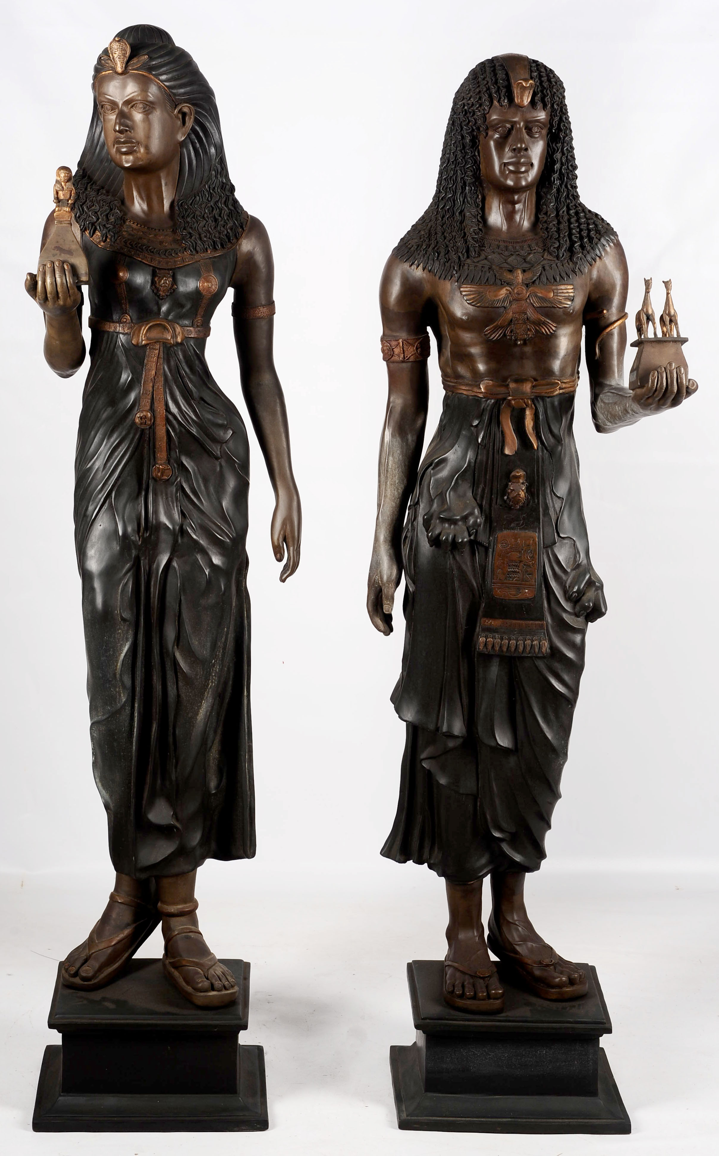 A PAIR OF LIFE-SIZED EGYPTIAN REVIVAL BRONZE FIGUR