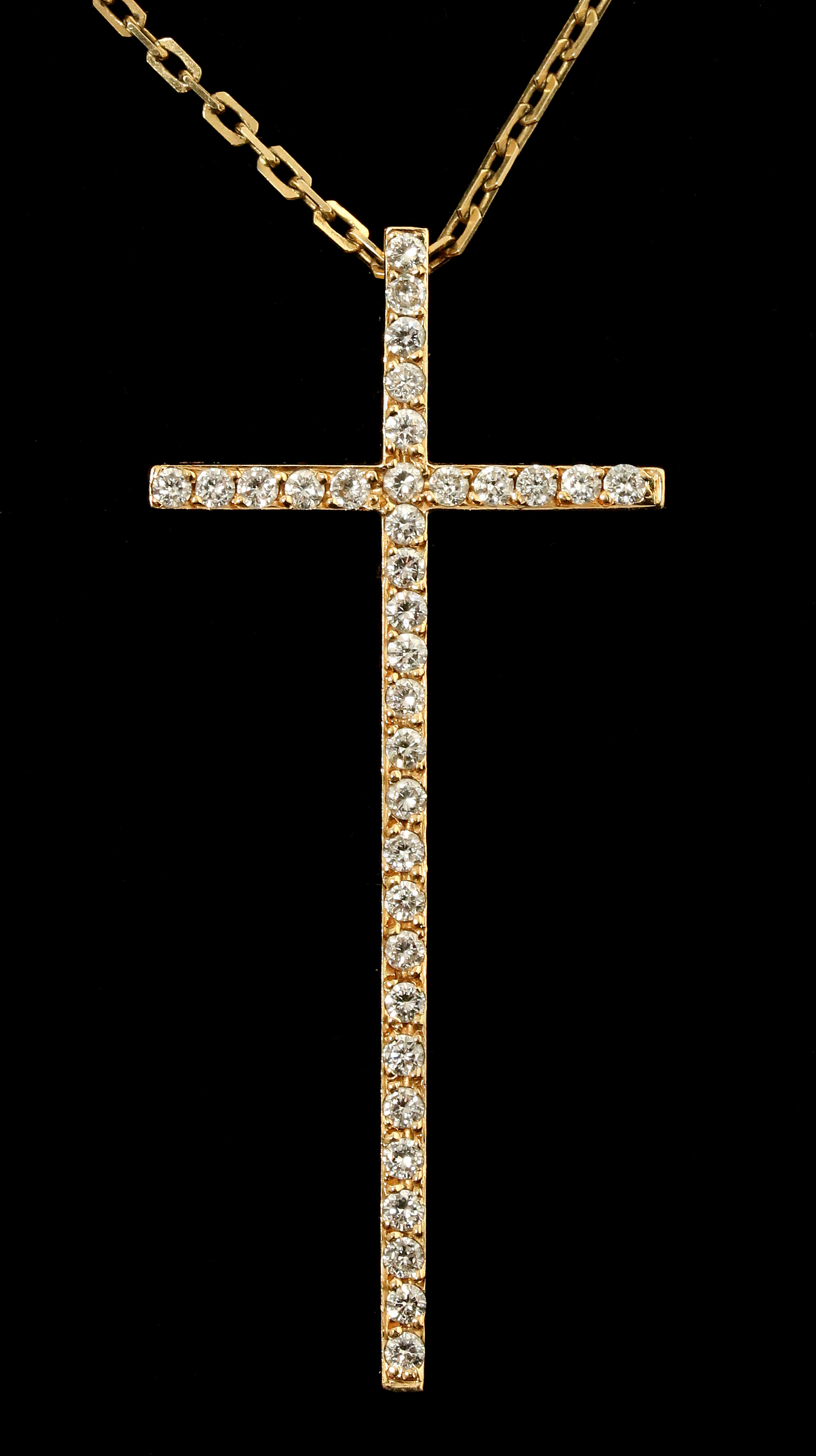AN 18K YELLOW GOLD CROSS WITH PAVE DIAMONDS