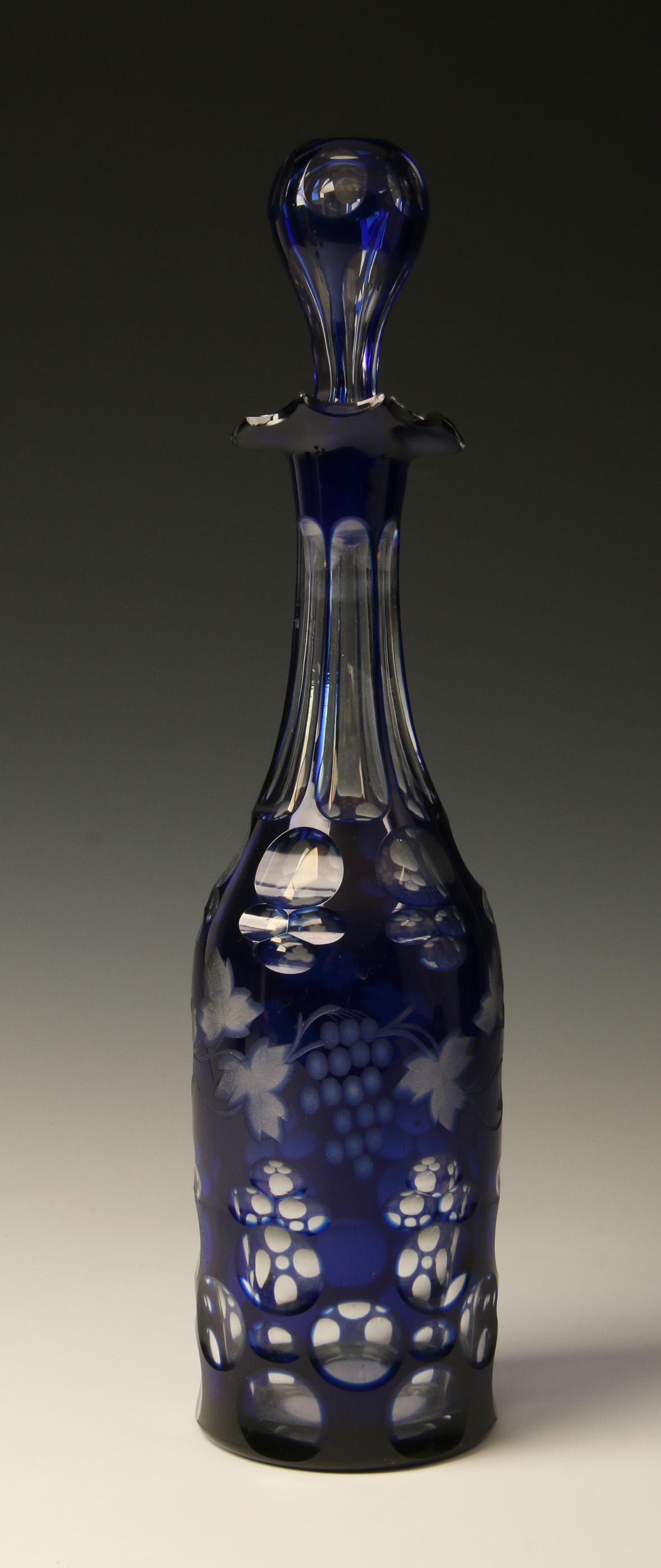 A 19TH CENTURY BLUE CUT TO CLEAR GLASS DECANTER