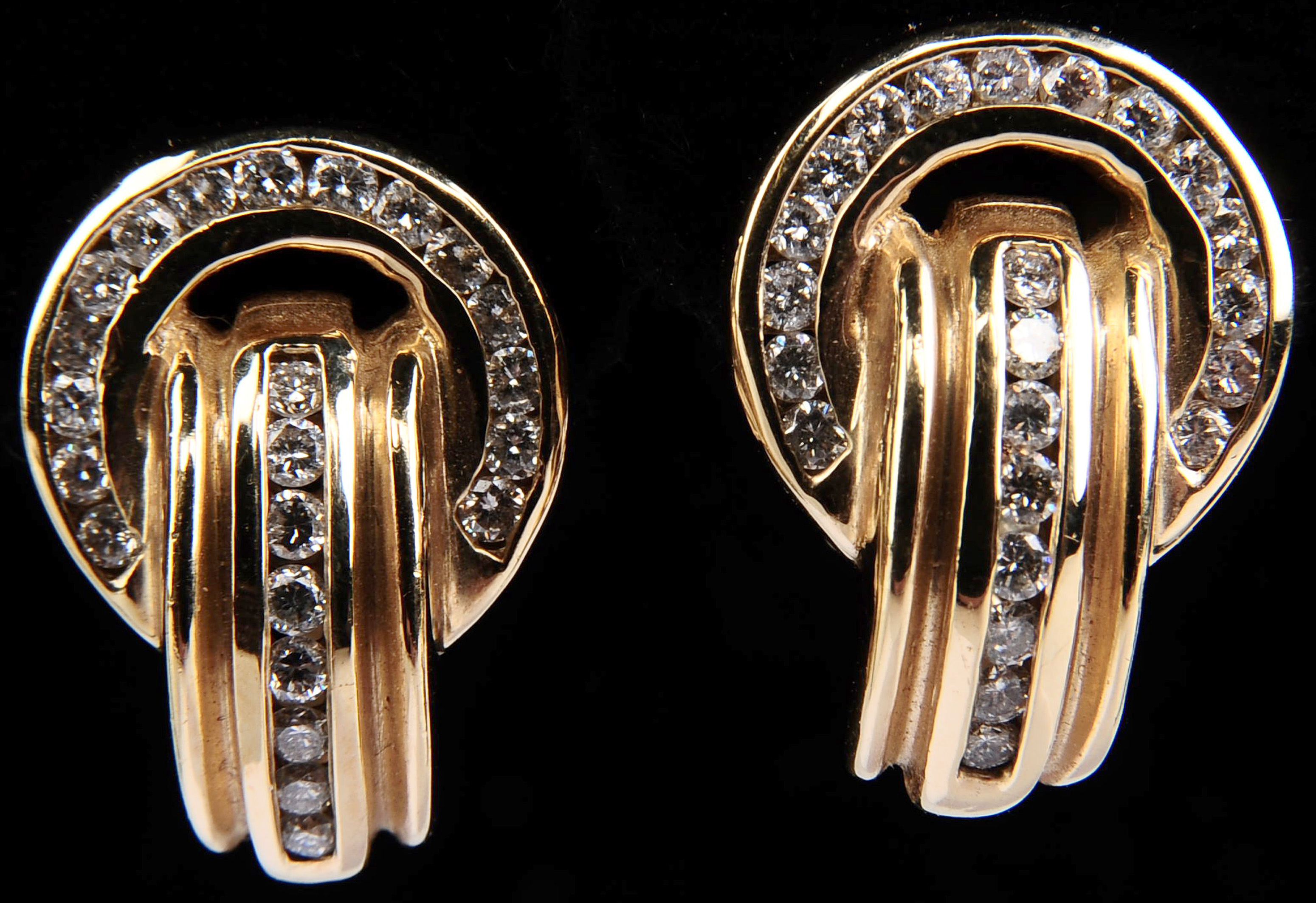 A PAIR OF YELLOW GOLD CHANNEL SET DIAMOND EARRINGS