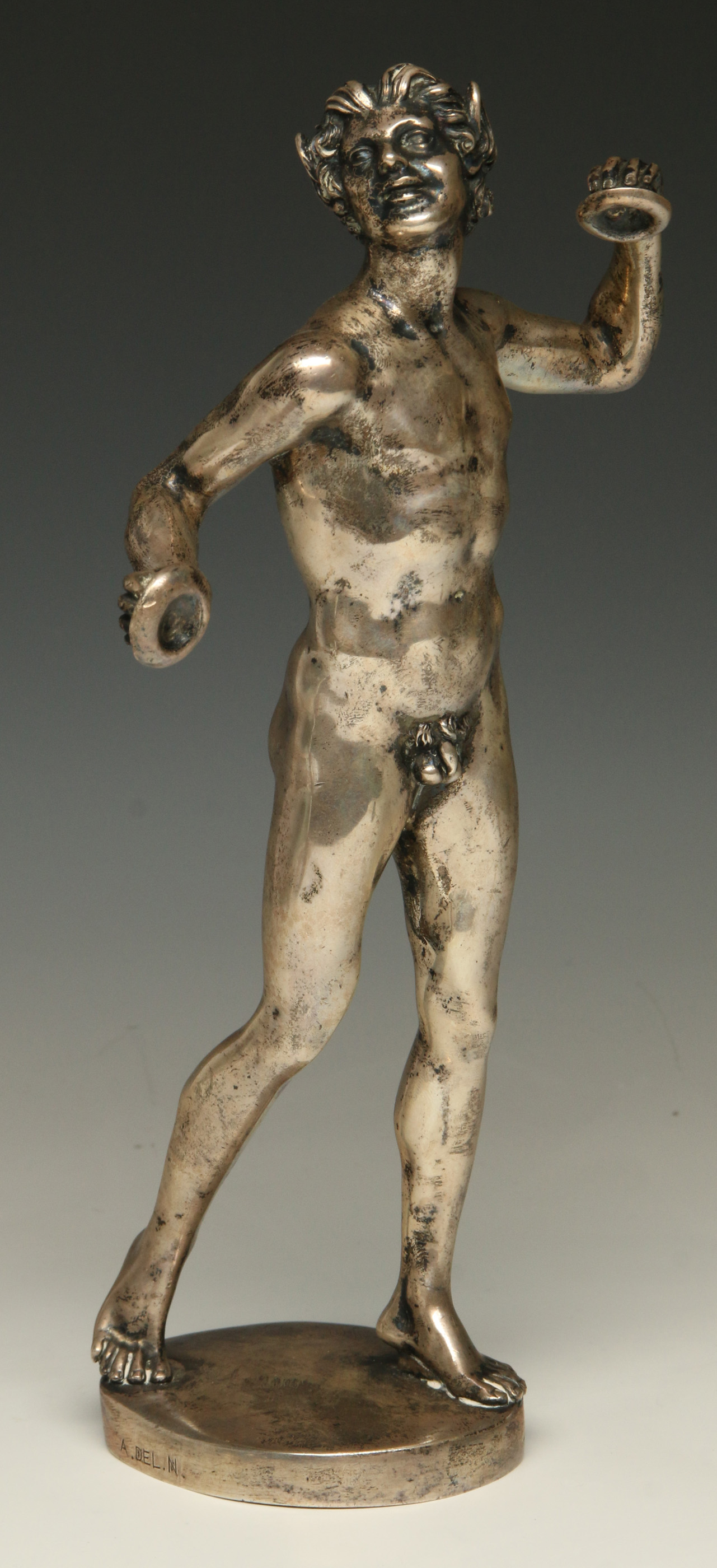 A 19TH C. SILVER DANCING SATYR WITH CYMBALS