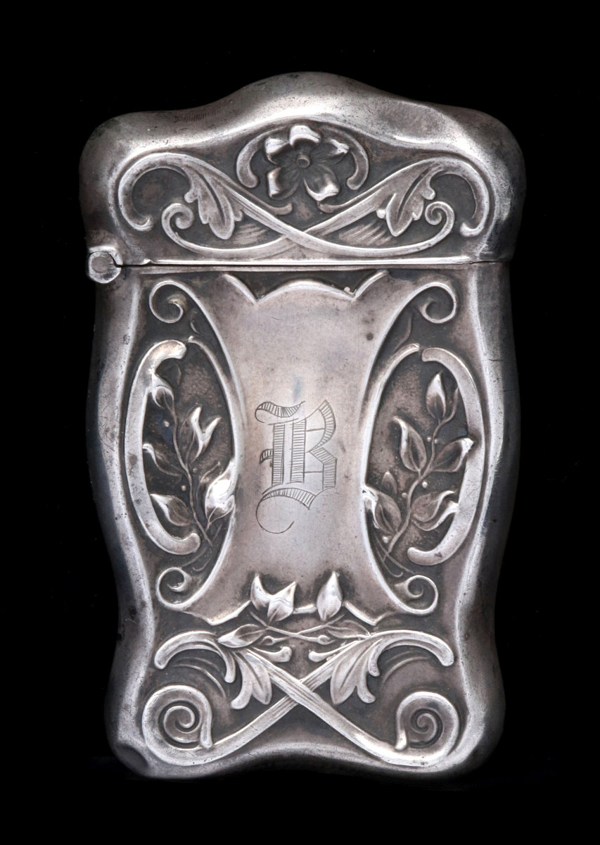 AN ANTIQUE STERLING SILVER MATCH SAFE