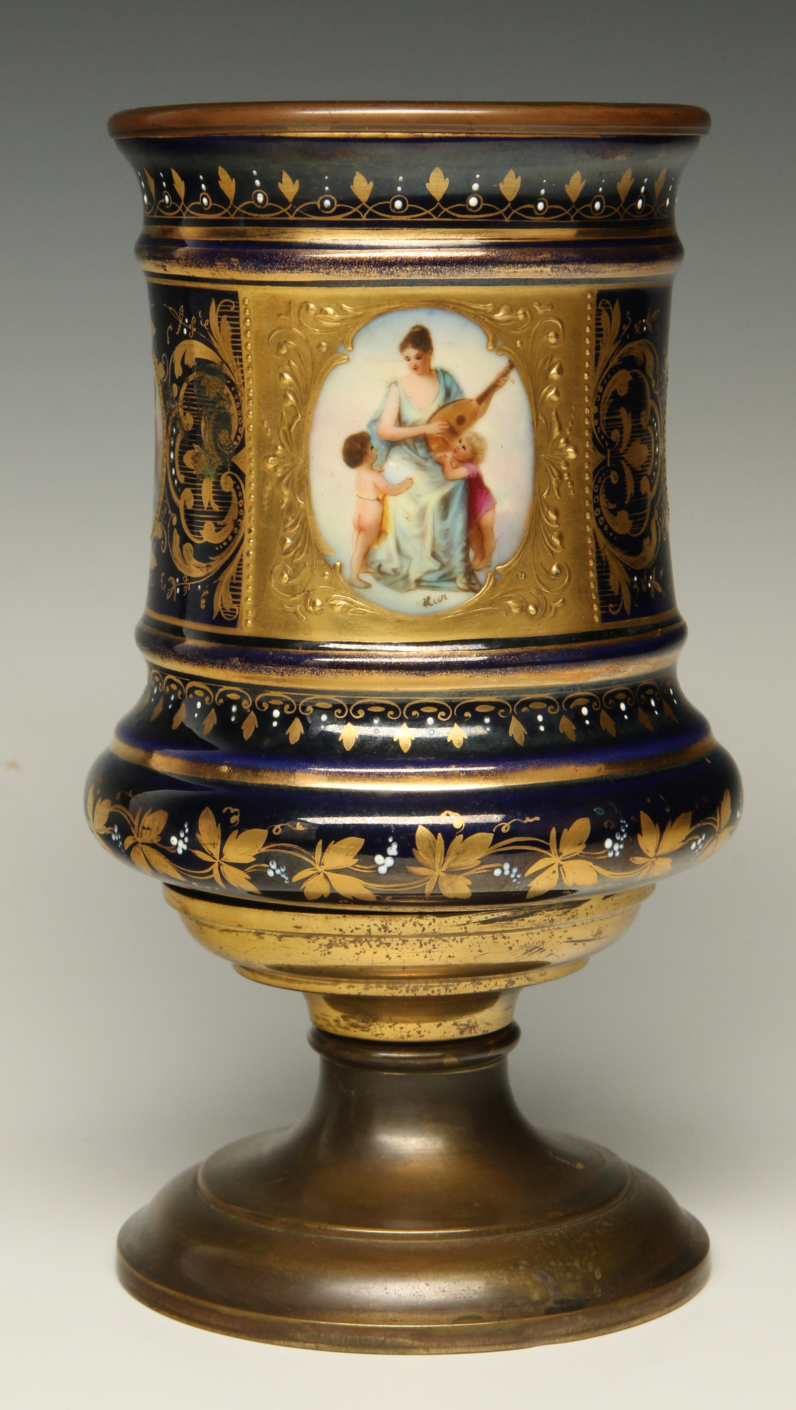 A 20TH C. SEVRES STYLE PORCELAIN AND BRASS URN