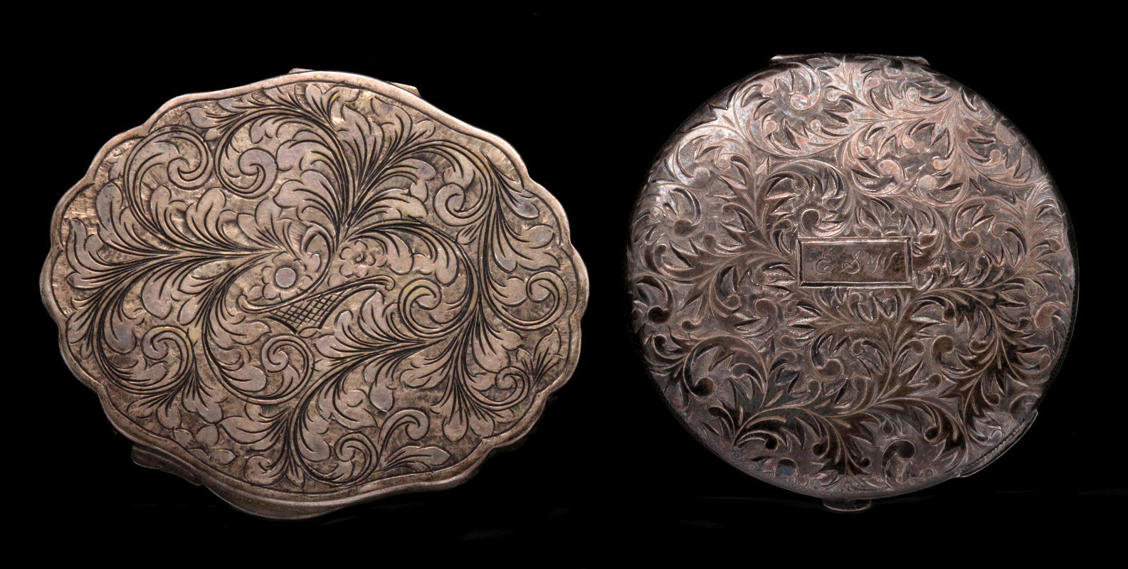 A HAND-CHASED STERLING COMPACT, PLUS ANOTHER