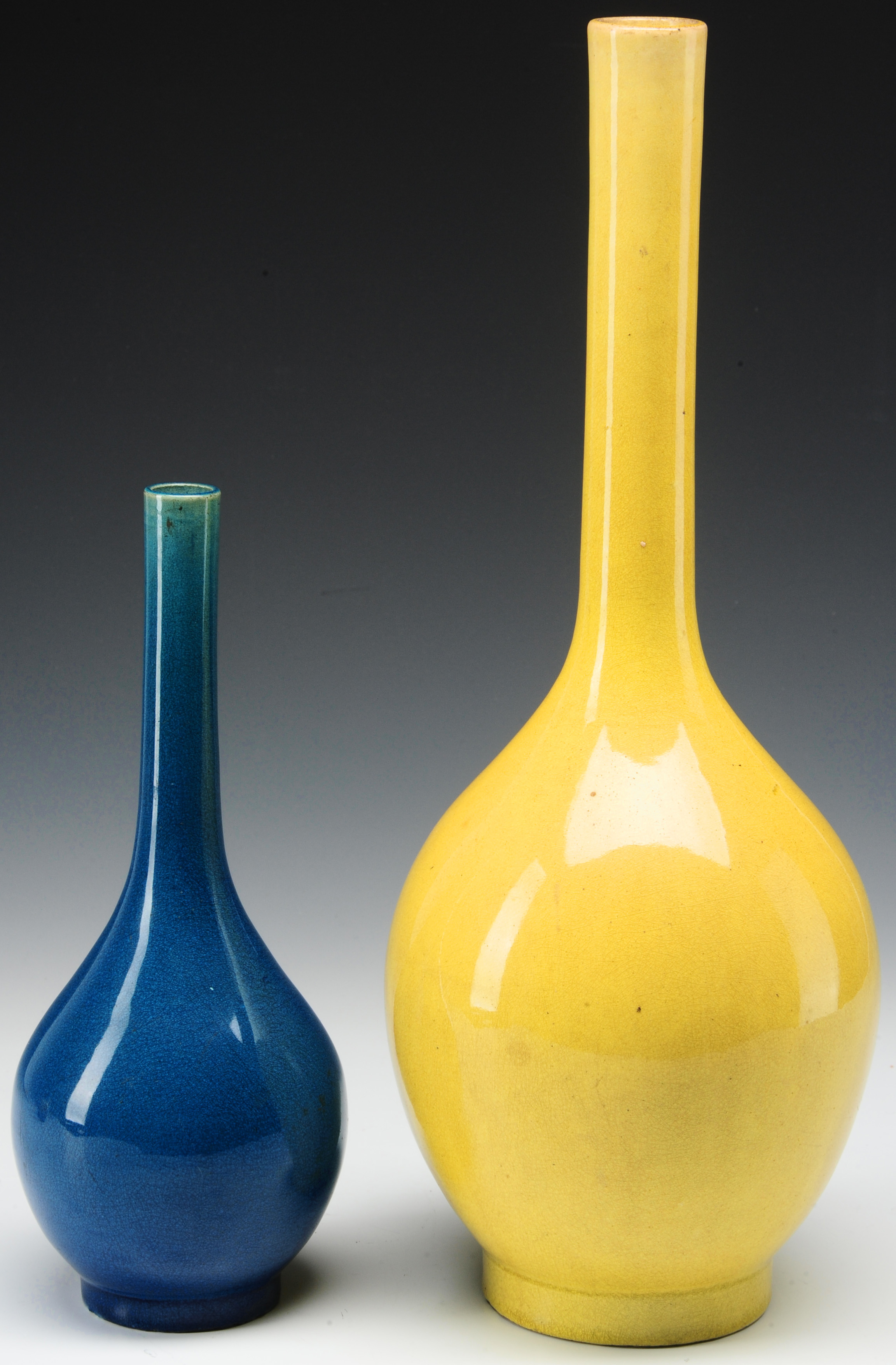 TWO CHINESE MONOCHROME POTTERY BOTTLE VASES