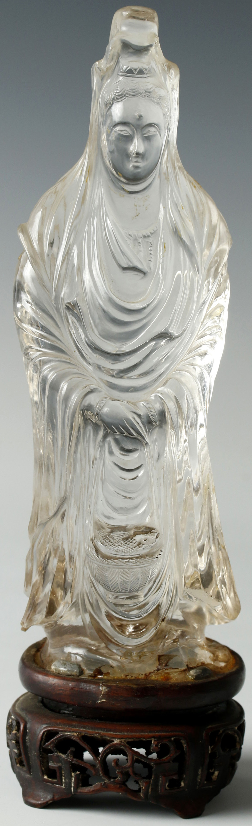 A CHINESE CARVED ROCK CRYSTAL FIGURINE