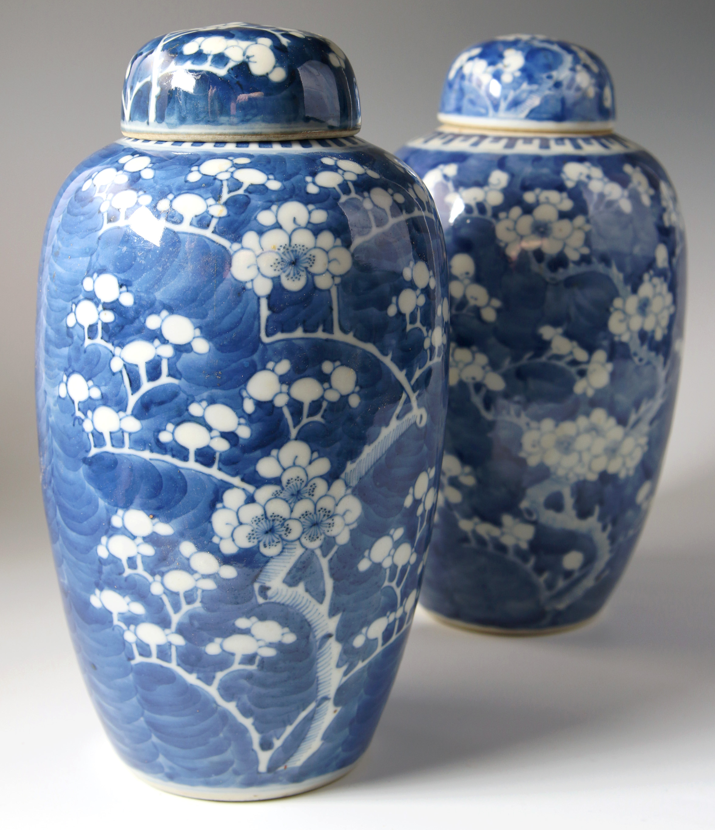 PAIR OF CHINESE COVERED PORCELAIN GINGER JARS