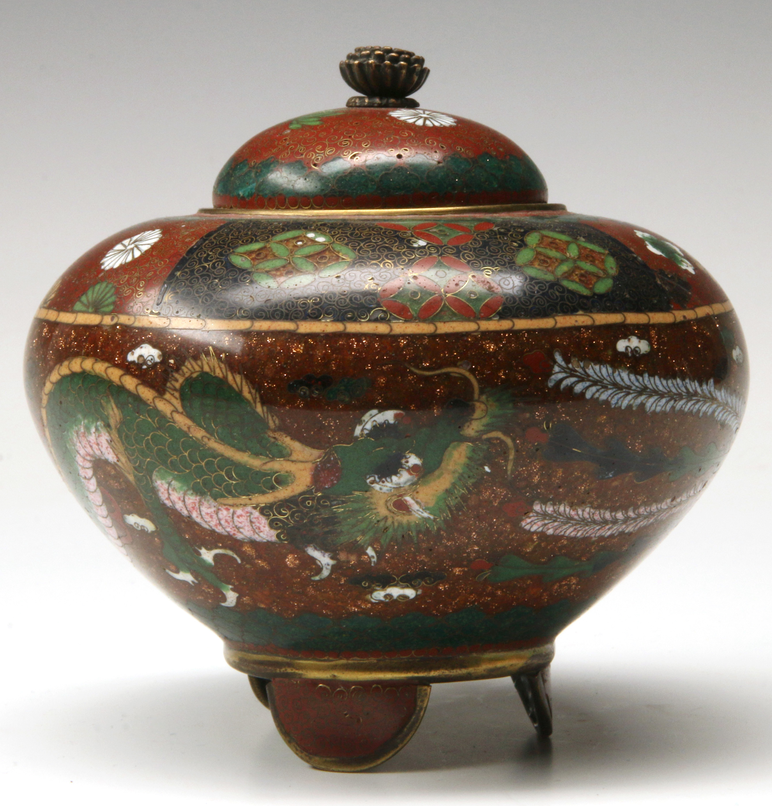 A FOOTED CLOISONNE COVERED JAR WITH IMPERIAL DRAGO