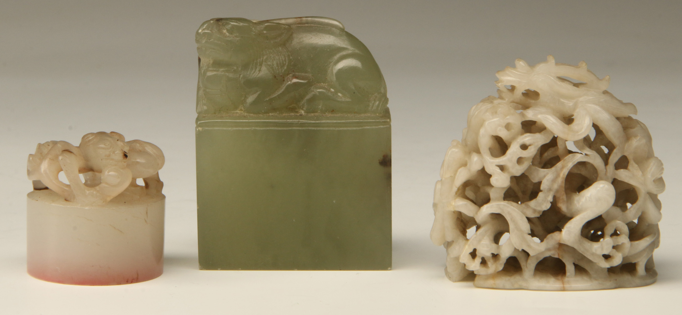 THREE SMALL ANTIQUE CHINESE CARVED JADE OBJECTS