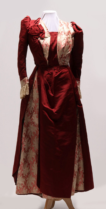 A CIRCA 1860 VICTORIAN SATIN DRESS WITH TUNIC