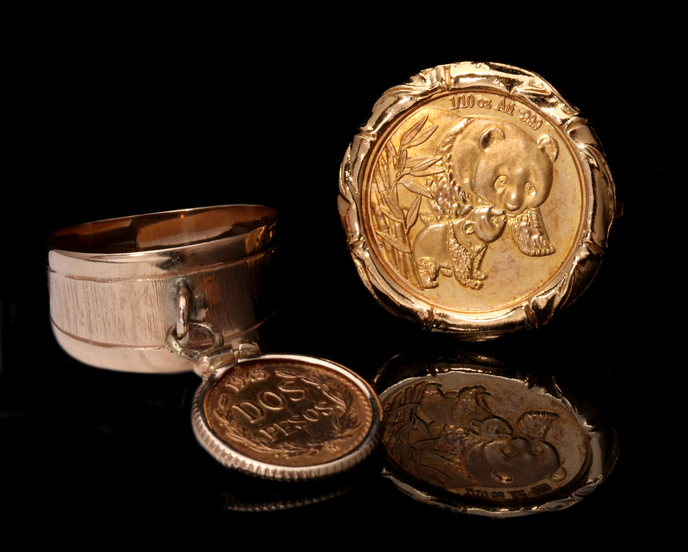 TWO FASHION RINGS WITH GOLD COIN AND MEDALLION