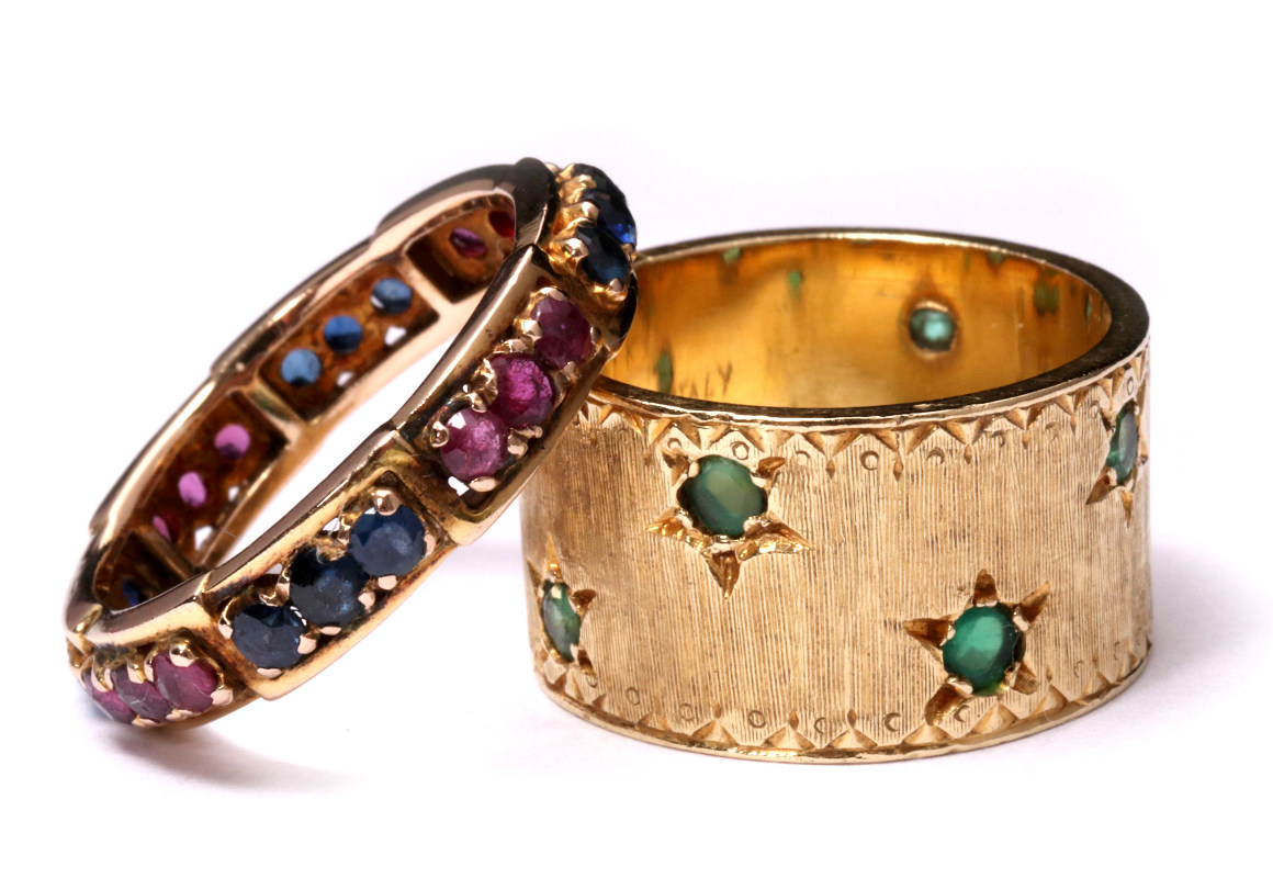 TWO SOLID KARAT GOLD RINGS WITH COLORED STONES