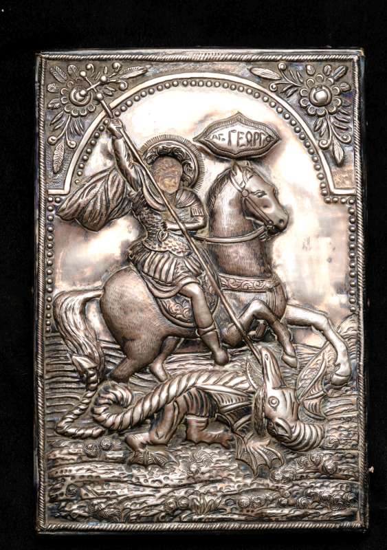 A 19TH CENTURY ST. GEORGE ICON WITH SILVER OKLAD