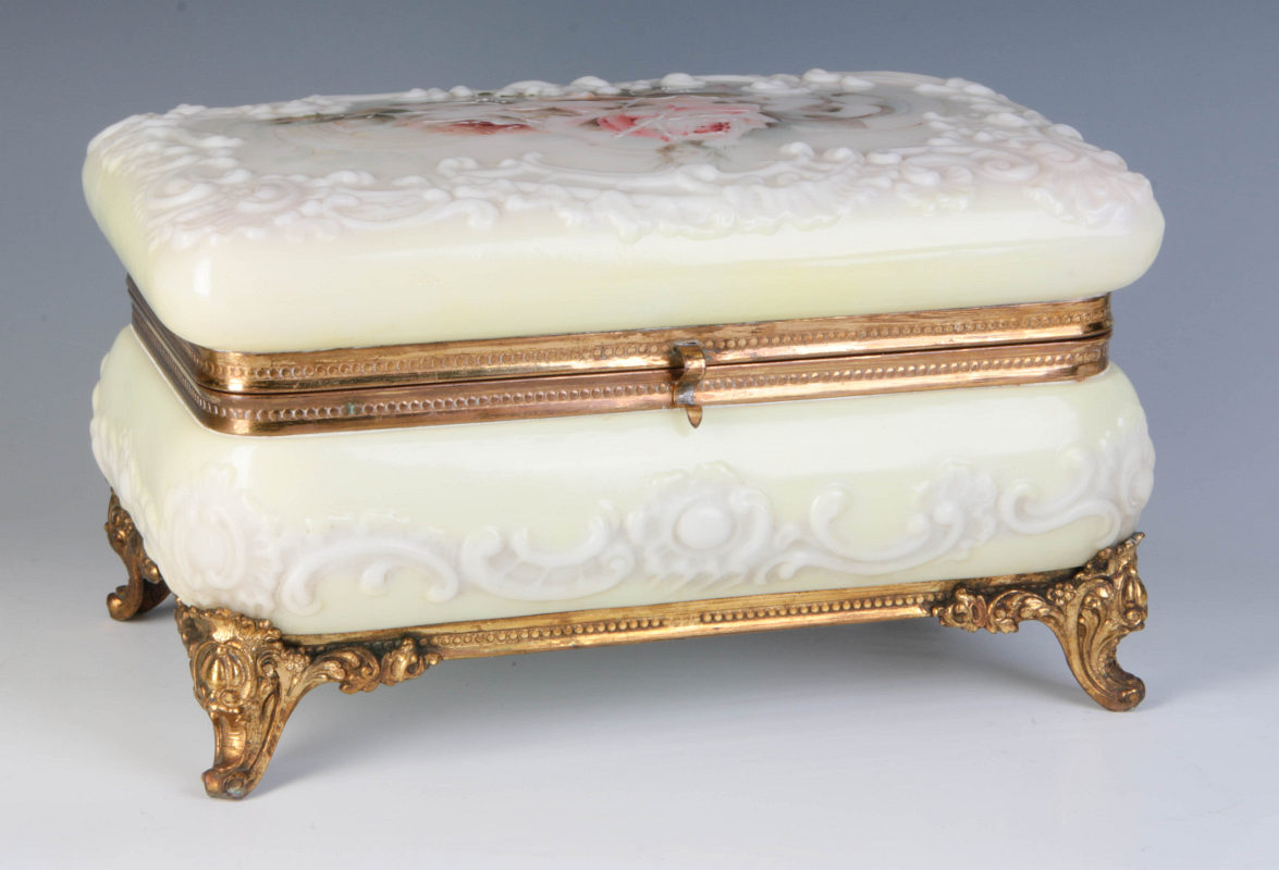 A LARGE 6 X 9 INCH WAVE CREST ORMOLU FOOTED BOX
