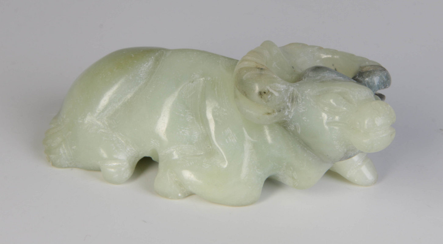 A CARVED JADE WATER BUFFALO