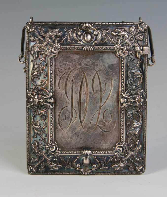 AN ORNATE VICTORIAN STERLING CALLING CARD CASE