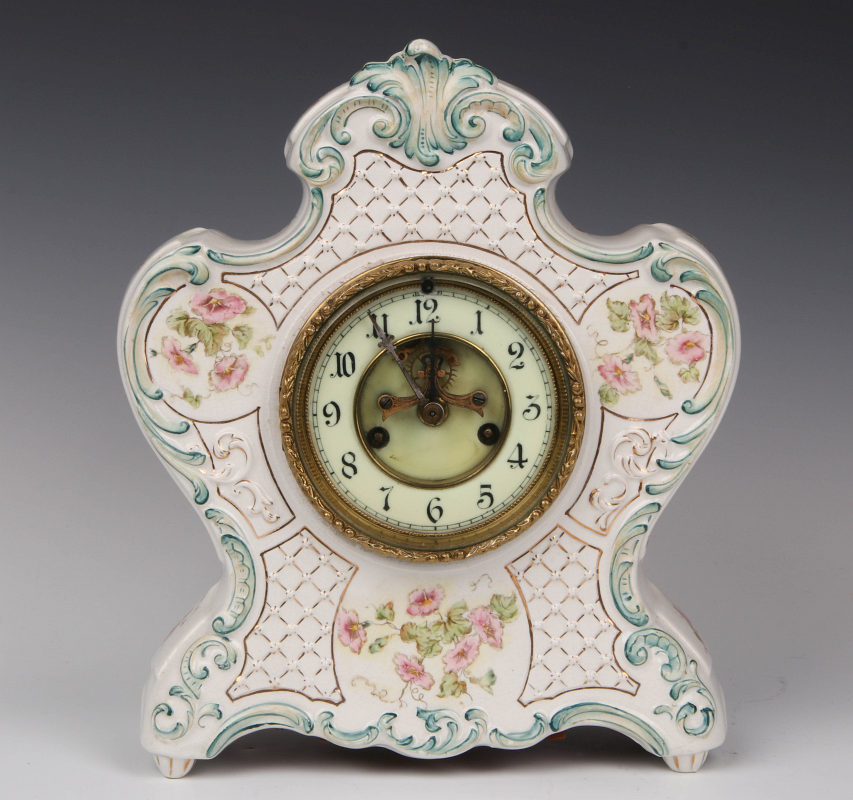 AN ANTIQUE CHINA CASE CLOCK WITH DOUBLE SUNK DIAL