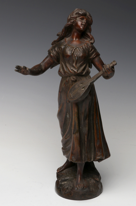 A PATINATED SPELTER FIGURE AFTER MOREAU