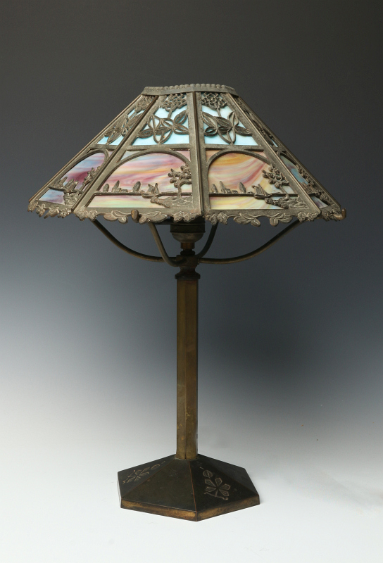 A BRADLEY AND HUBBARD PANEL LAMP WITH HARBOR SCENE