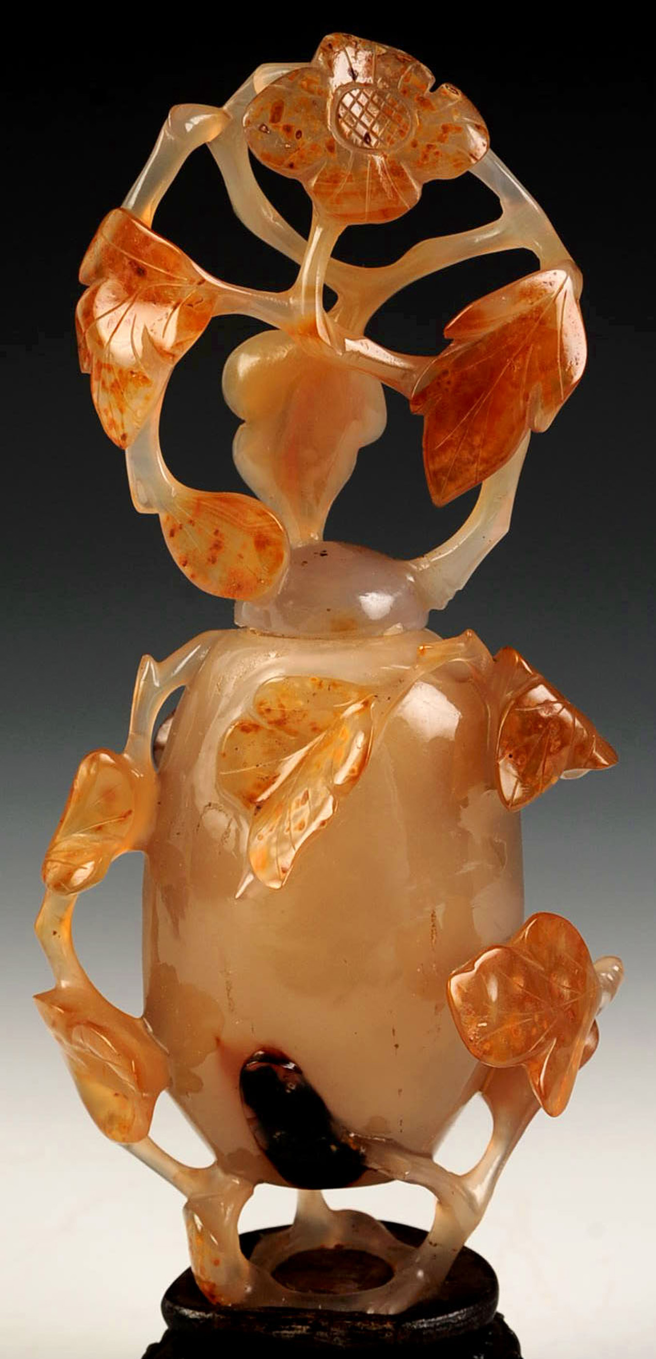 A CHINESE CARVED AGATE COVERED VASE