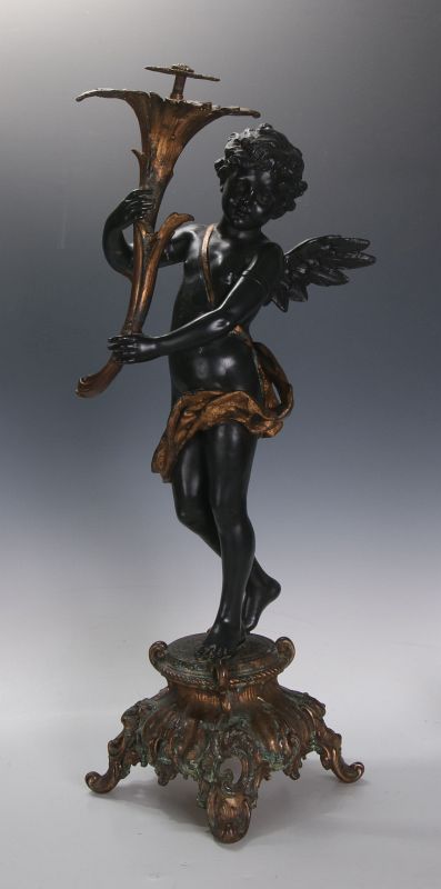 AN ANTIQUE 24-INCH PATINATED SPELTER CUPID FIGURE