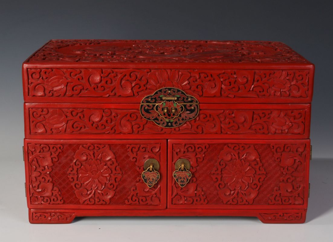 A LARGE CINNABAR JEWELRY CASKET WITH CLOISONNE