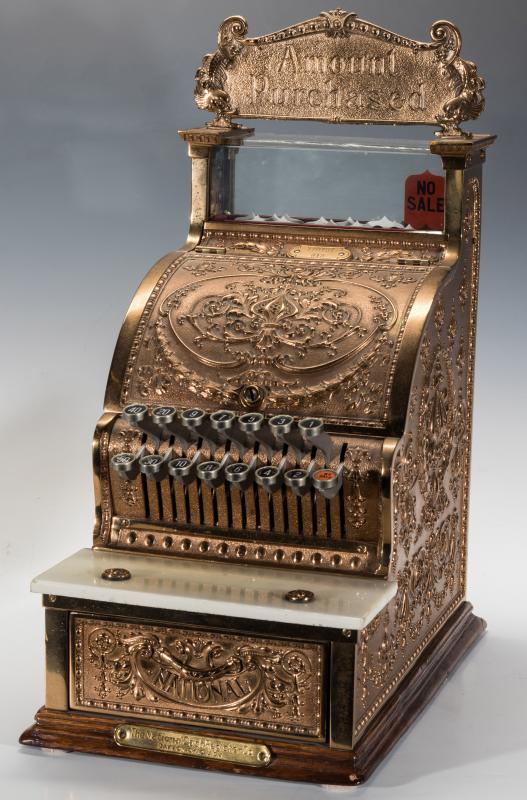 A MODEL 312 NATIONAL CASH REGISTER WITH TOP SIGN