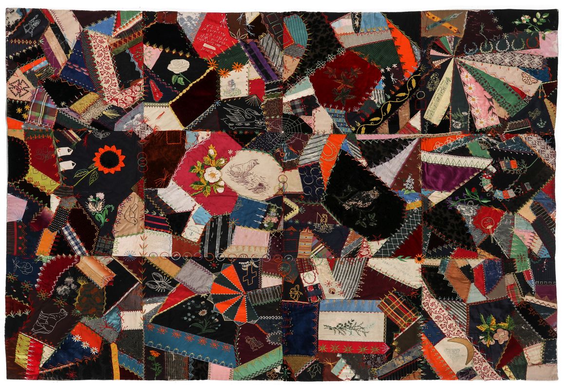 A 19TH C. CRAZY QUILT FILLED WITH VICTORIAN MOTIFS