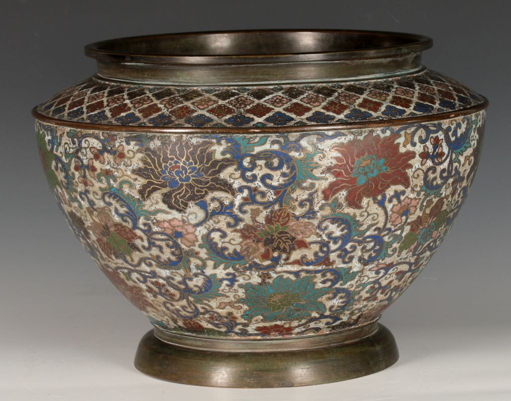 A CHINESE BRONZE JARDINIERE WITH CHAMPLEVE' ENAMEL