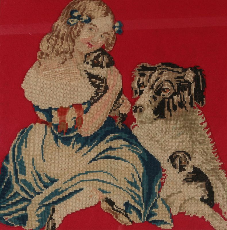 A 19TH CENT NEEDLEWORK PICTURE OF GIRL WITH PUPPY