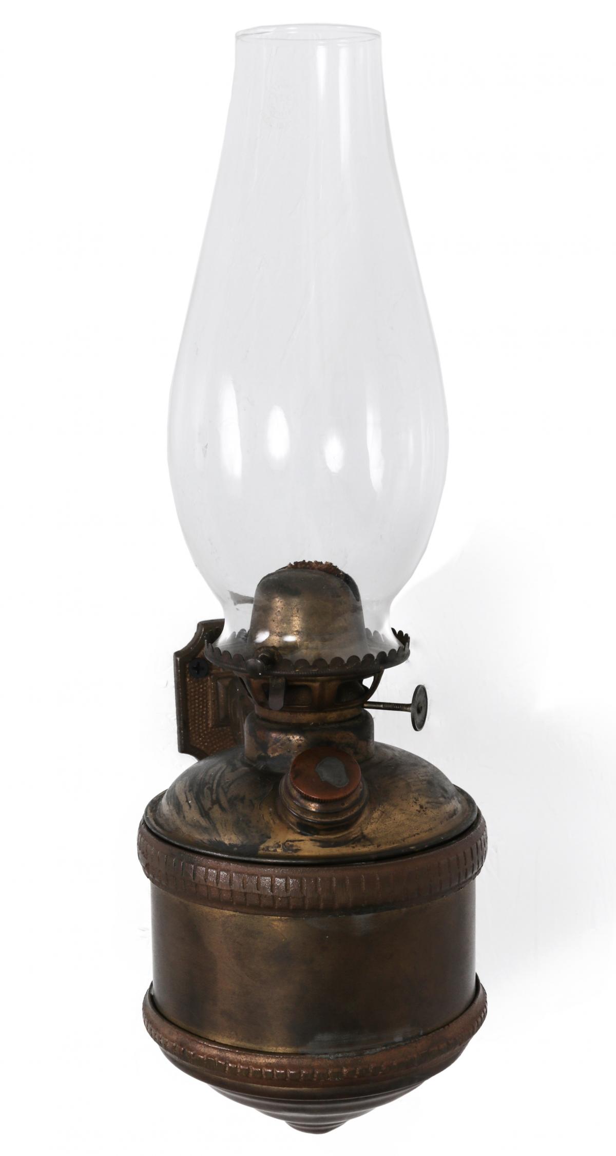 A 19TH CENT RAILCAR SIDE OIL LAMP IN IRON HOLDER