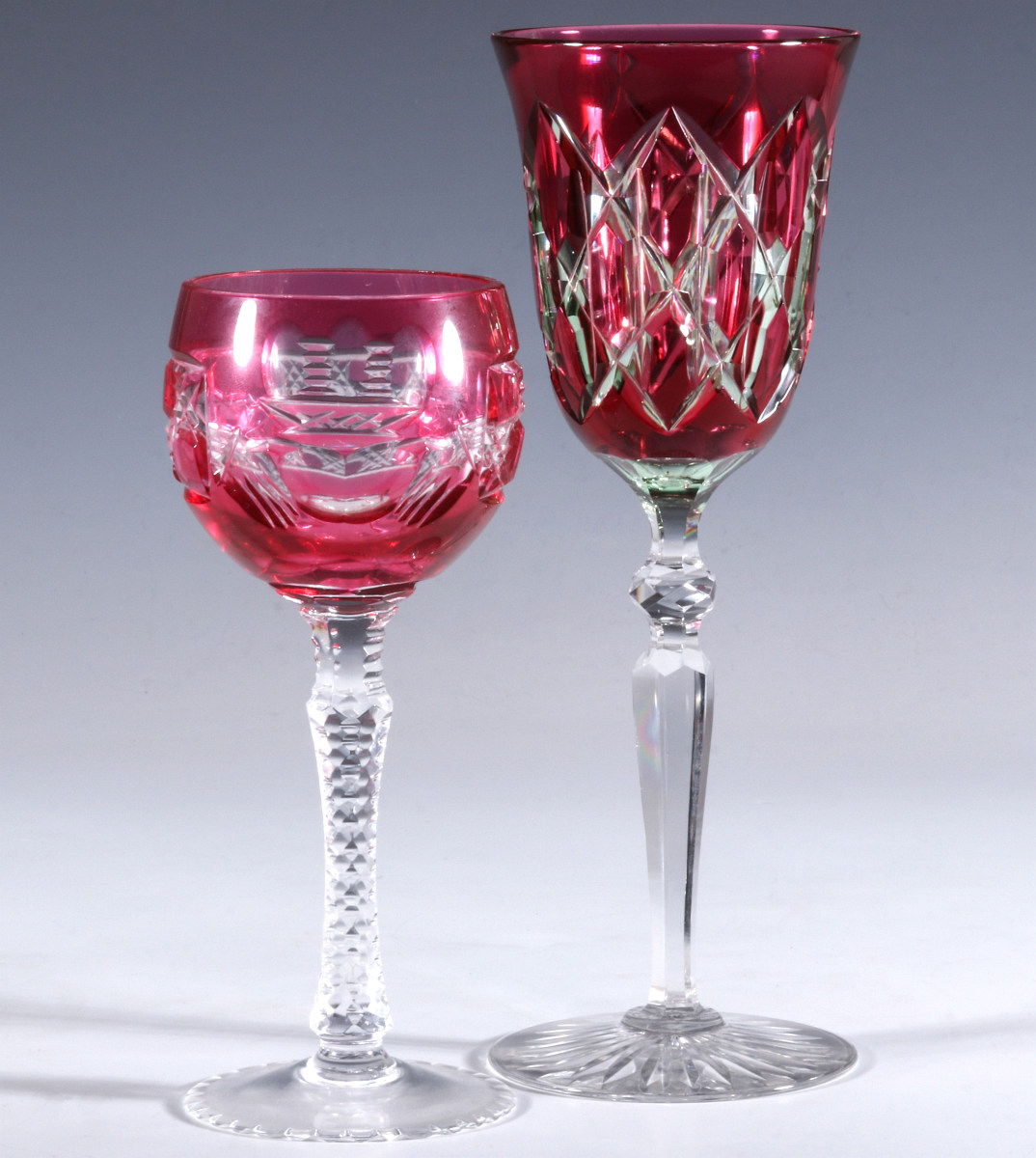 A DAISY AND BUTTON CRANBERRY CUT TO CLEAR GOBLET
