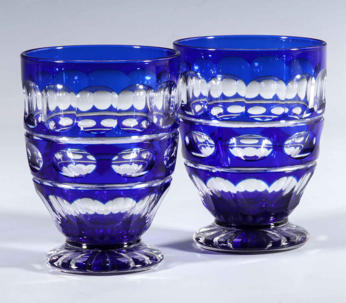 TWO BOHEMIAN BLUE CUT TO CLEAR FOOTED TUMBLERS