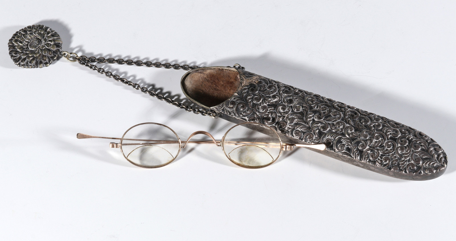 A VICTORIAN SILVER PLATED CHATELAINE EYEGLASS CASE