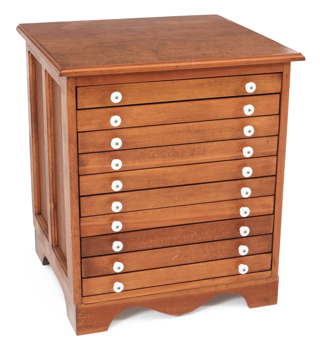 A LATE 20TH CENTURY TEN DRAWER PANELED CABINET