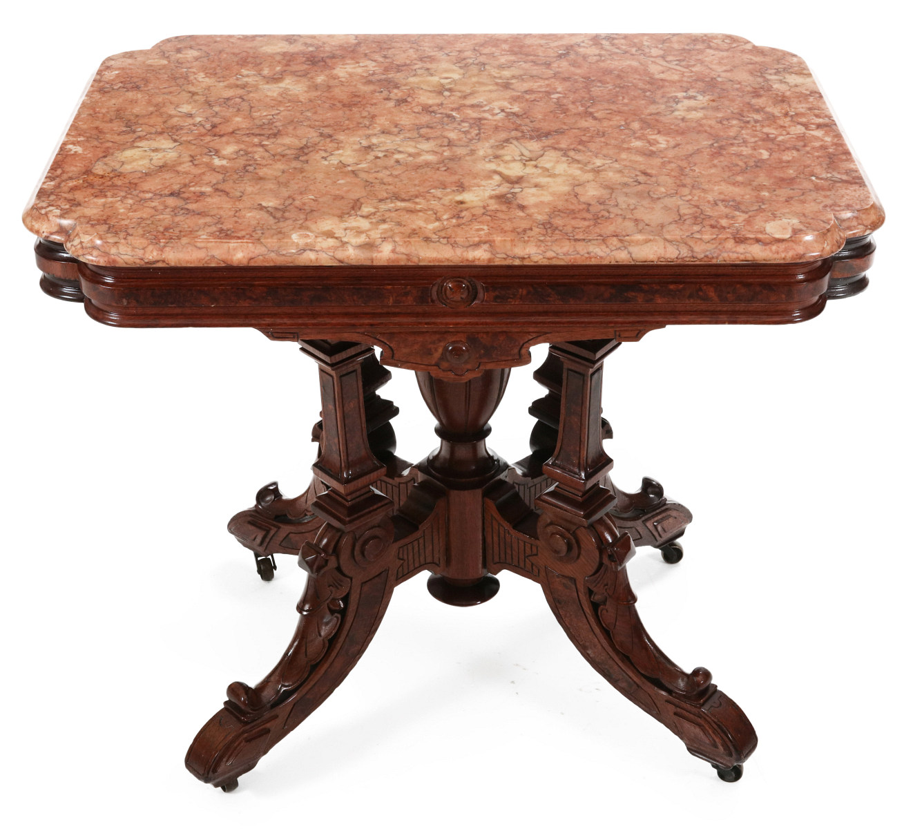 AN ELABORATELY CARVED 19TH C. WALNUT CENTER TABLE
