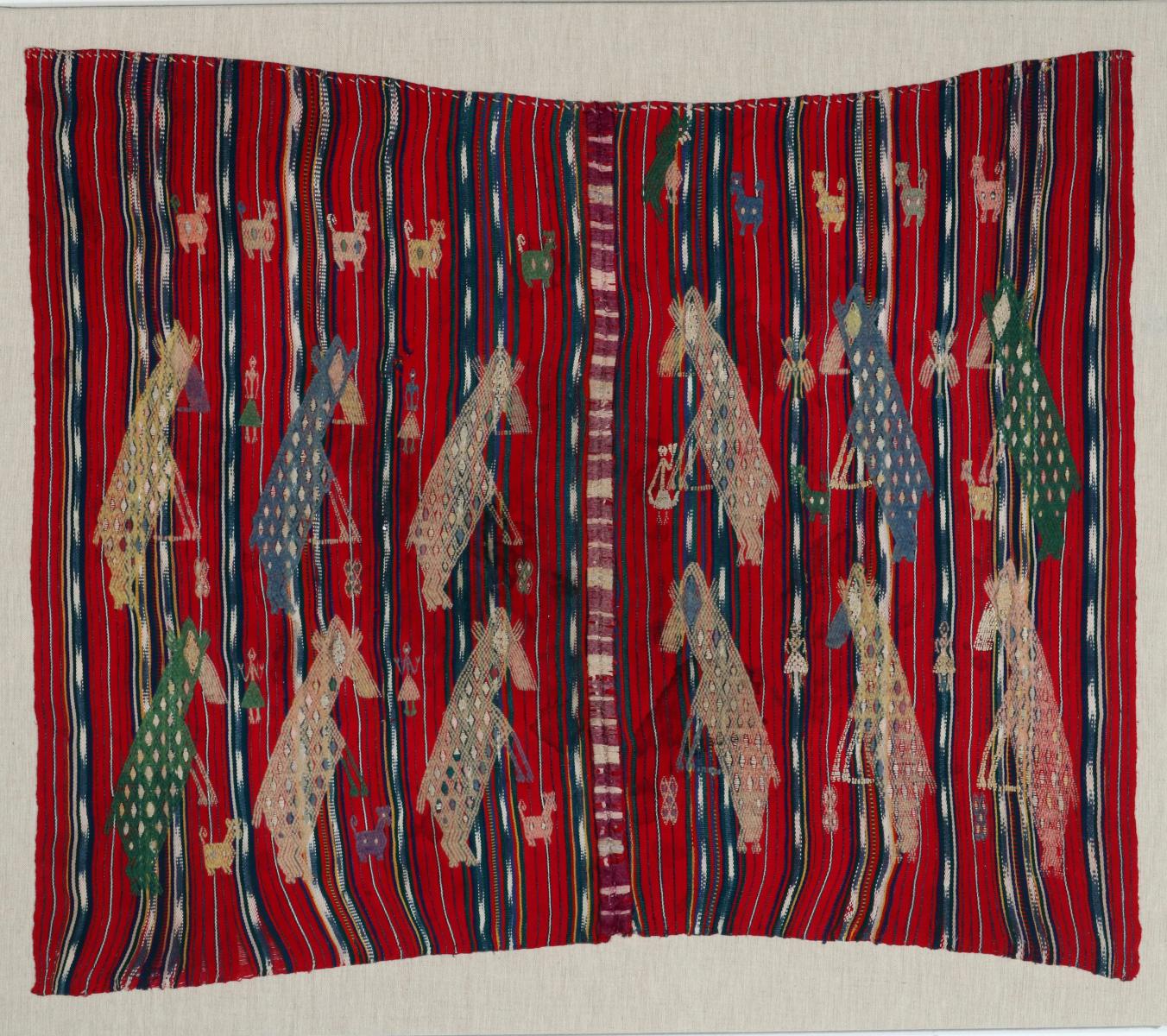 A VINTAGE LOOMED TEXTILE WITH EMBROIDERED FIGURES