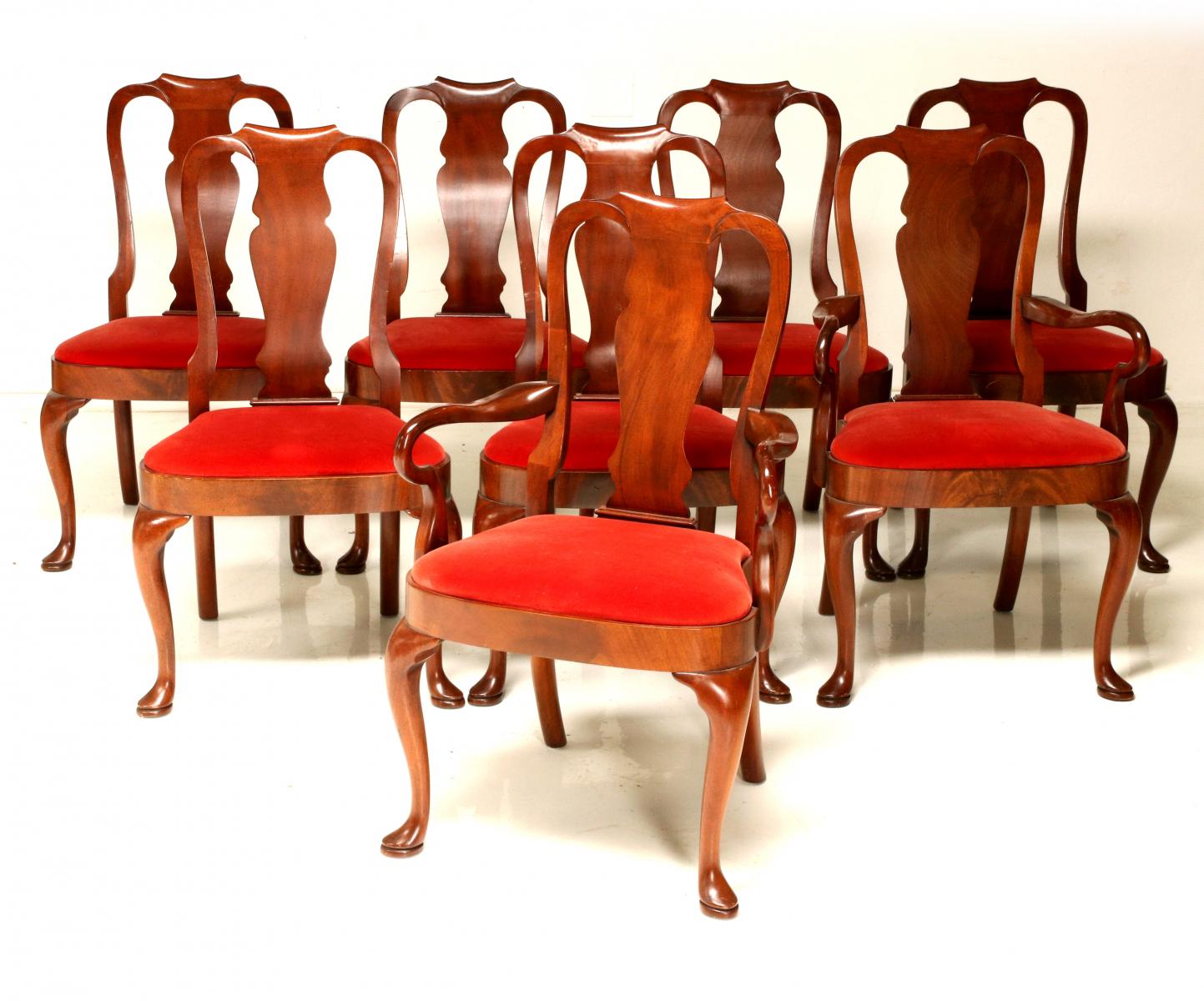 A SET OF EIGHT QUEEN ANNE STYLE DINING CHAIRS