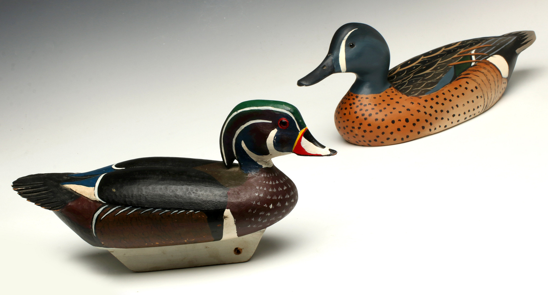 LATE 20TH C. WOOD DUCK AND BLUE-WINGED TEAL DECOYS