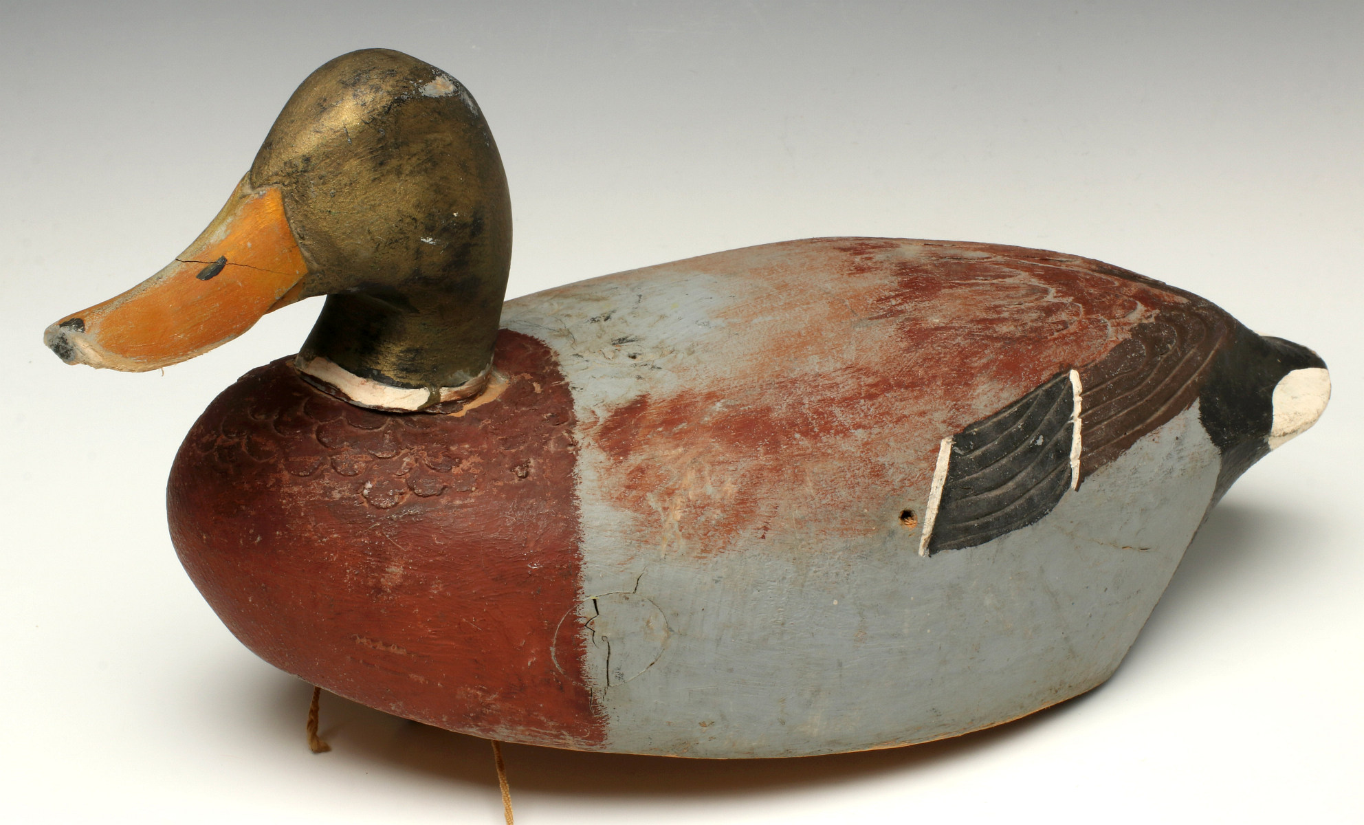 A MALLARD DRAKE CARVED AND PAINTED WOOD DECOY