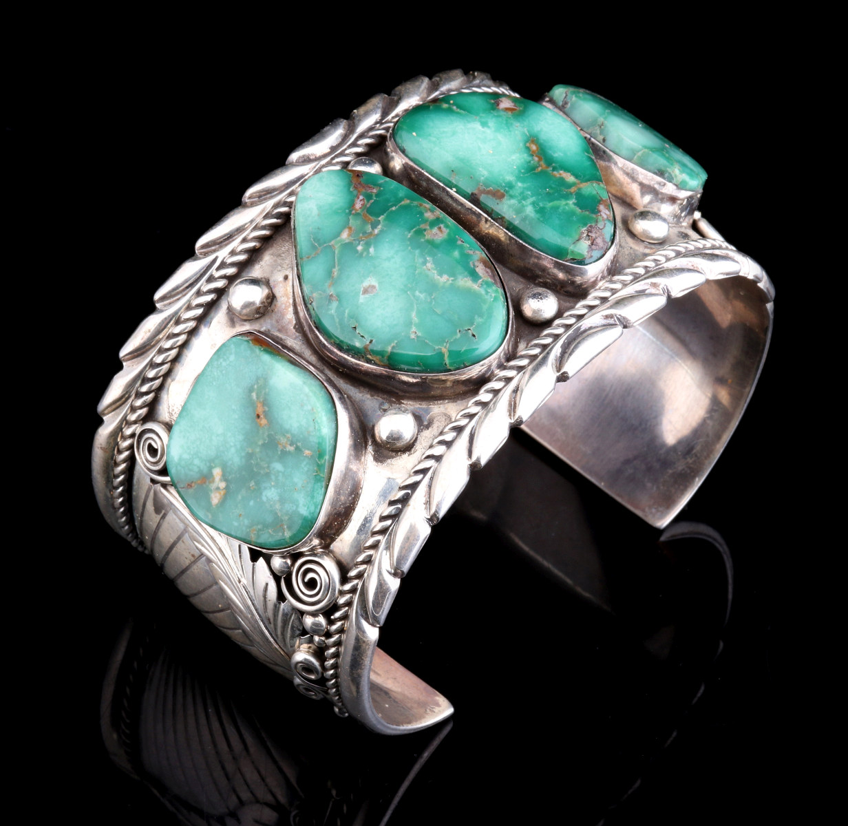 A LARGE TURQUOISE CUFF SIGNED JOANN YAZZIE