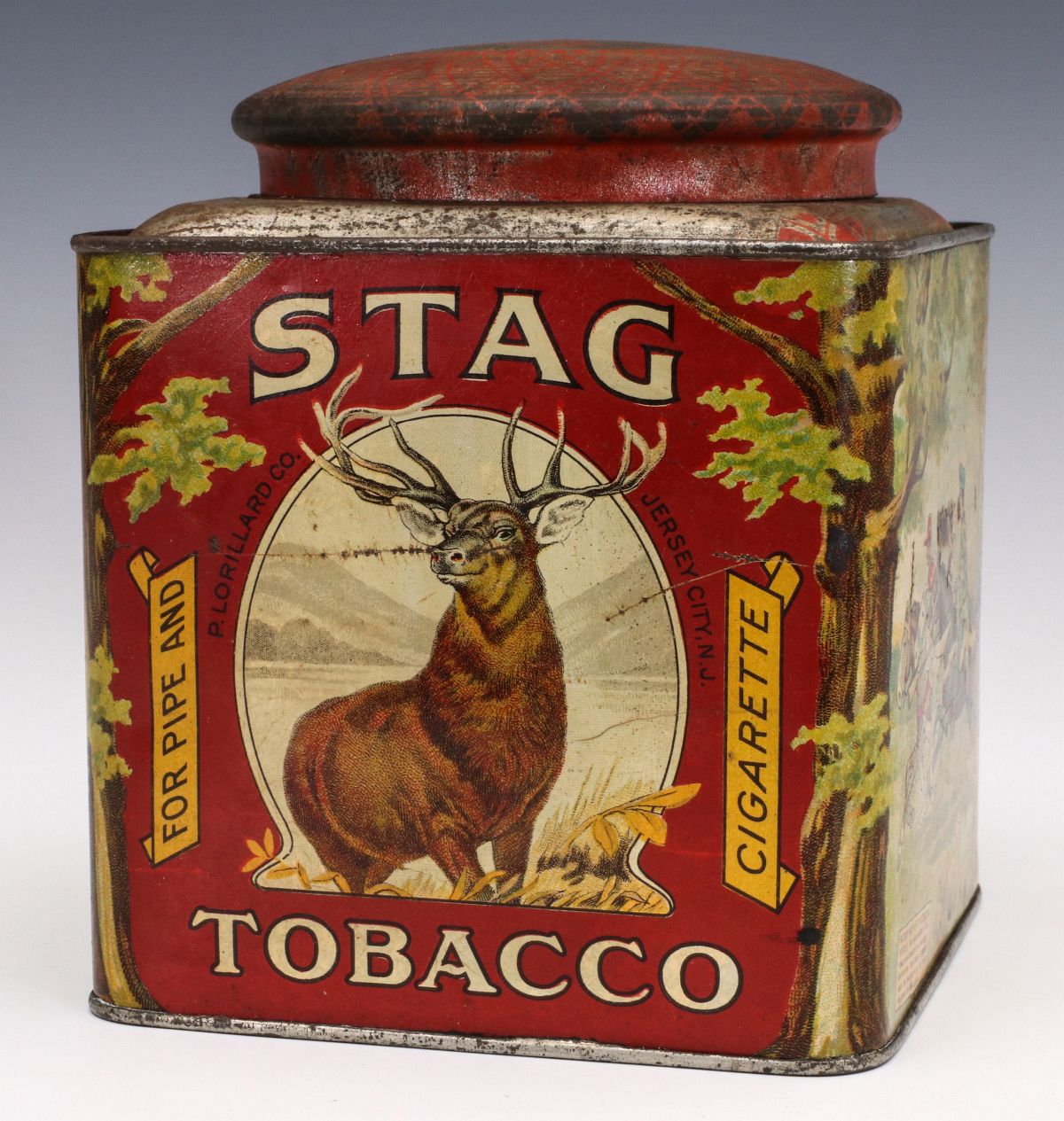 A LORILLARD TOBACCO STAG BRAND TIN LITHO CONTAINER