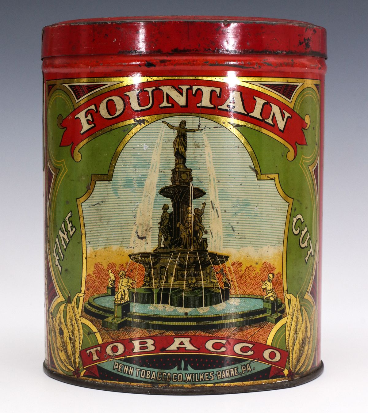 A RARE AND COLORFUL 'FOUNTAIN' BRAND TOBACCO CAN