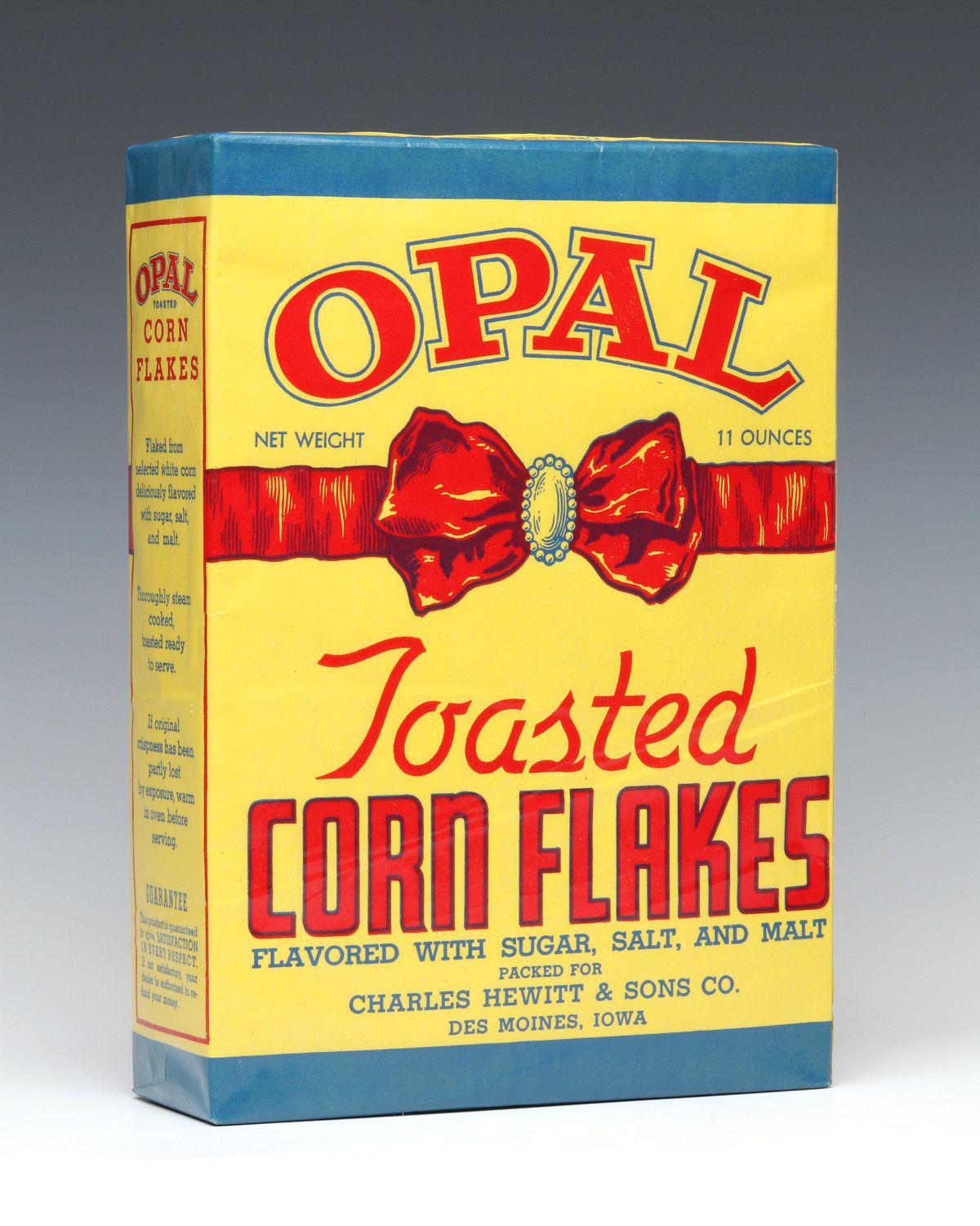AN OPAL BRAND TOASTED CORN FLAKES CONTAINER