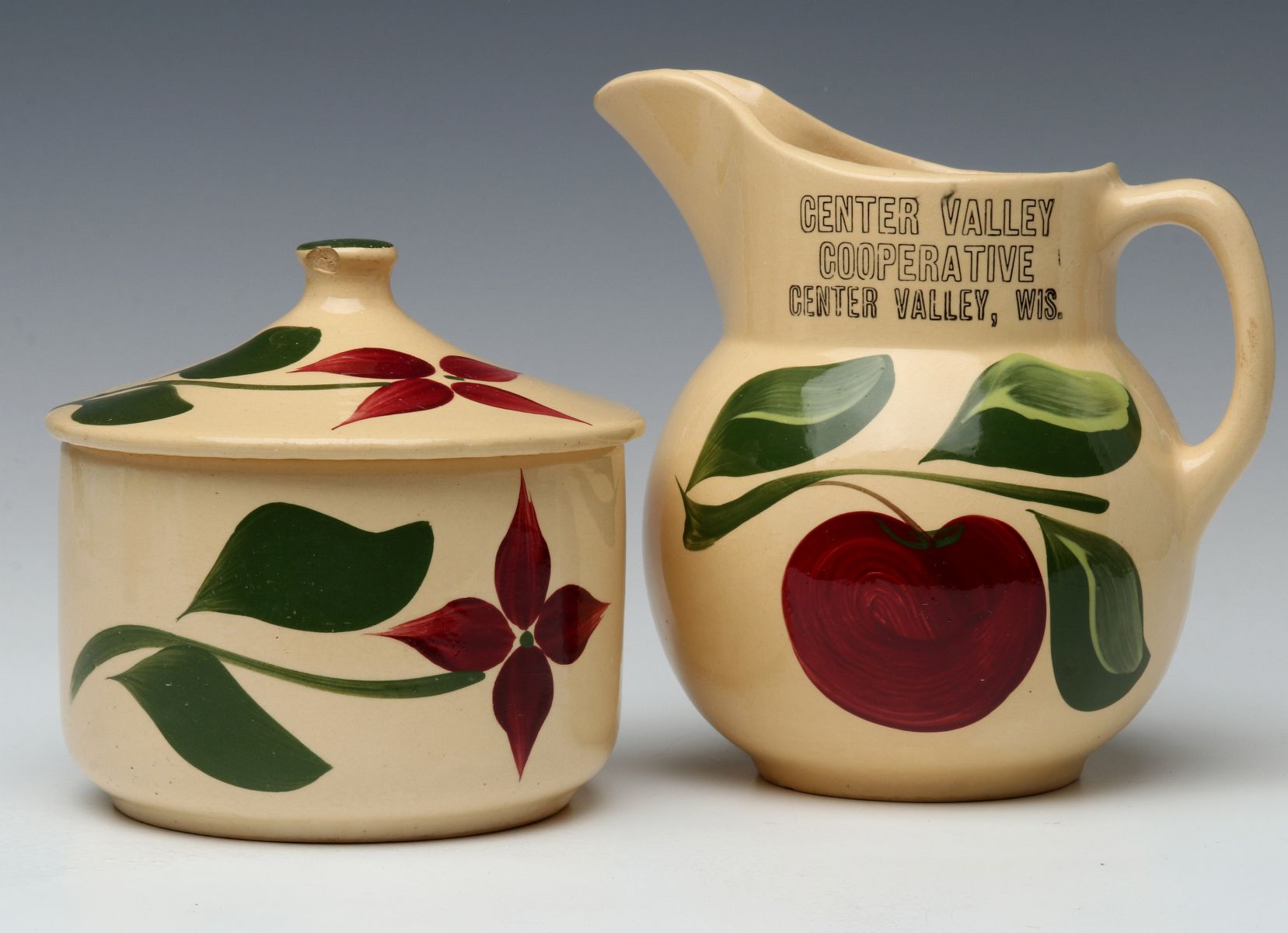 TWO WATT POTTERY PIECES WITH ADVERTISING