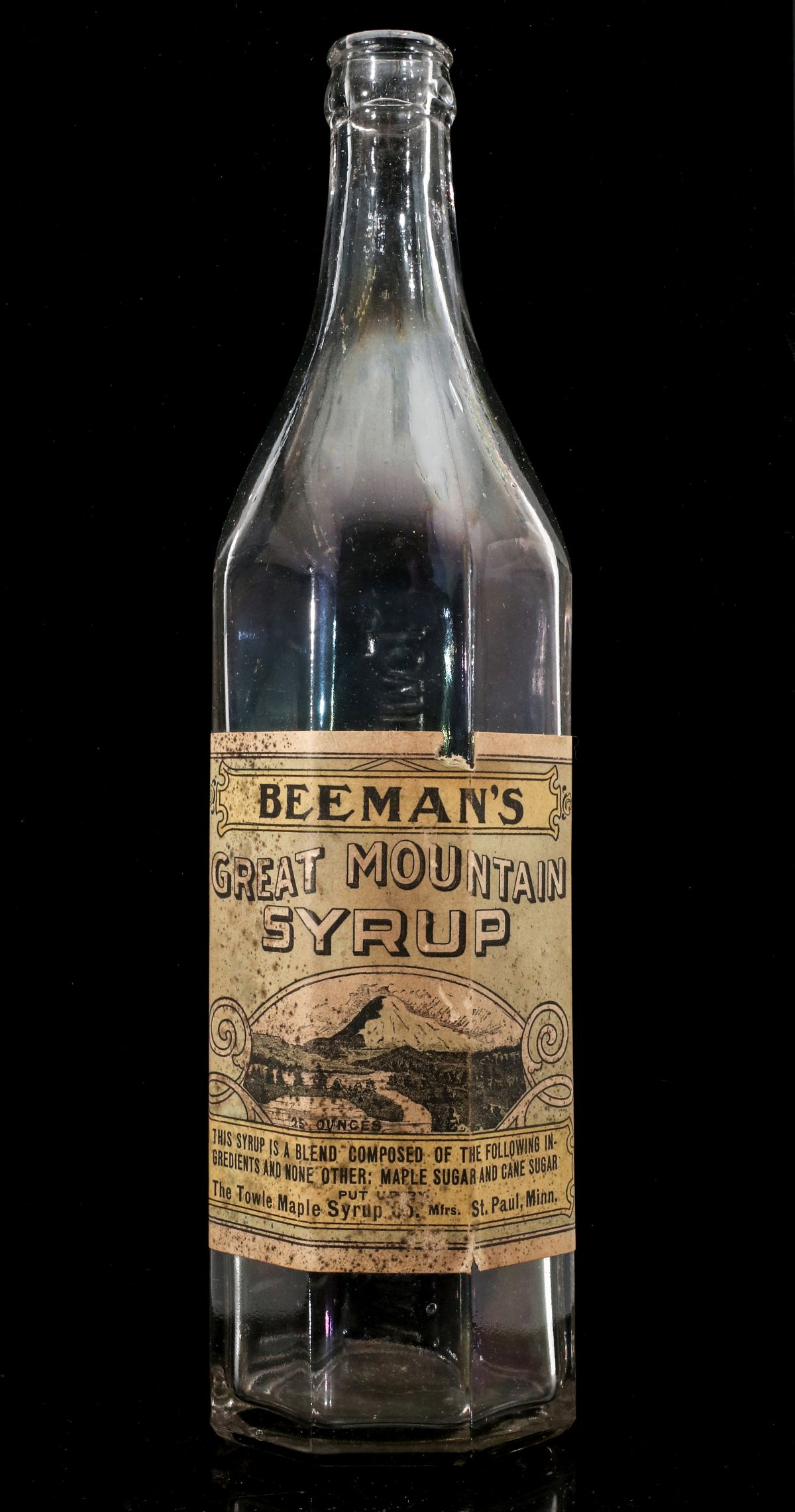 A BEEMAN'S / TOWLE MAPLE SYRUP BOTTLE WITH LABEL