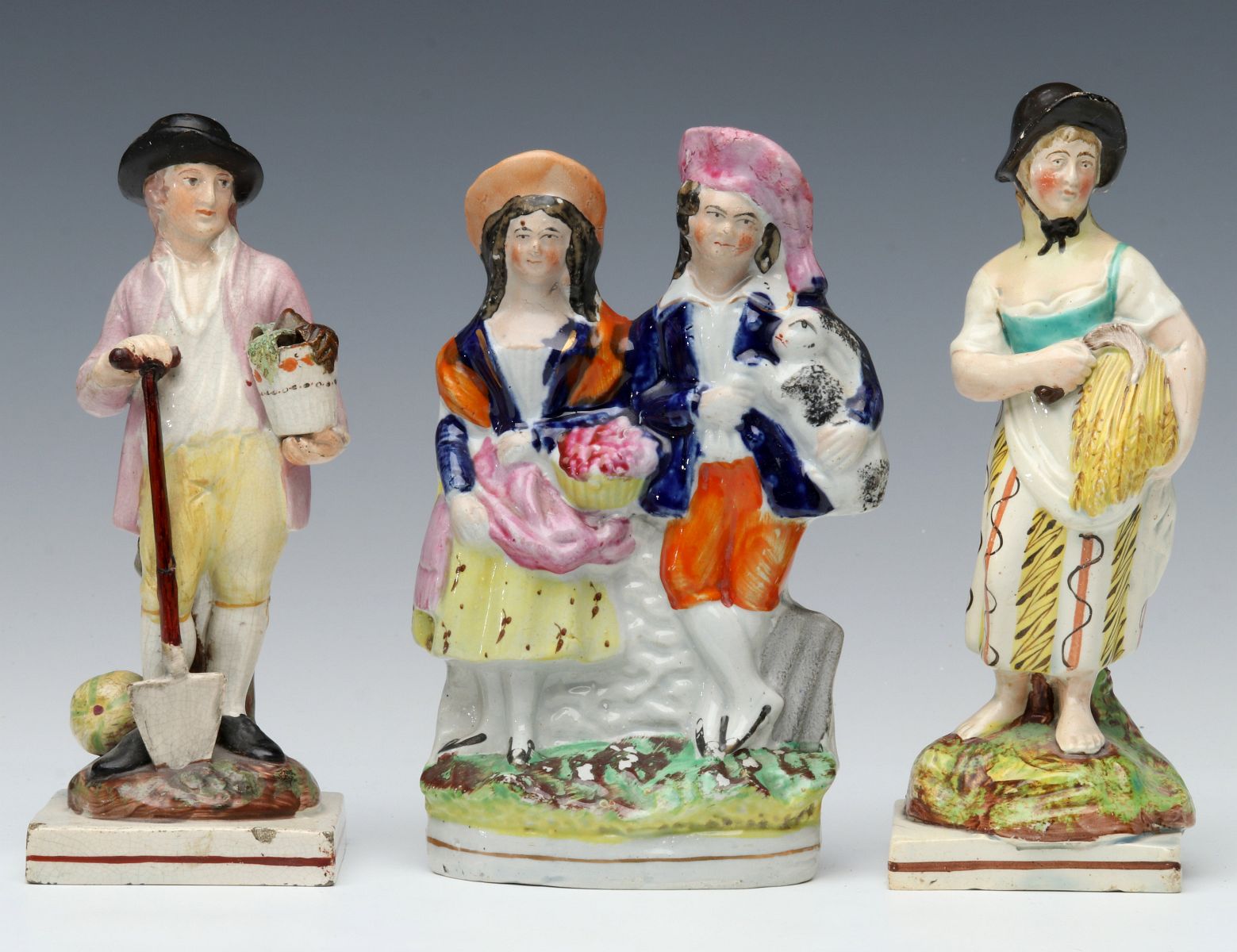 A PAIR EARLY STAFFORDSHIRE FIGURES PLUS ANOTHER